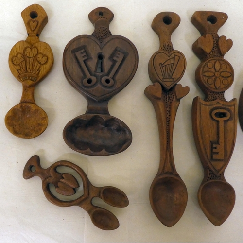 142 - Ten country made carved love spoons of varying, individual design&nbsp; largest 12