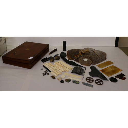 147 - A box of restoration materials: to include fragments of tortoiseshell, bone and mother-of-pearl