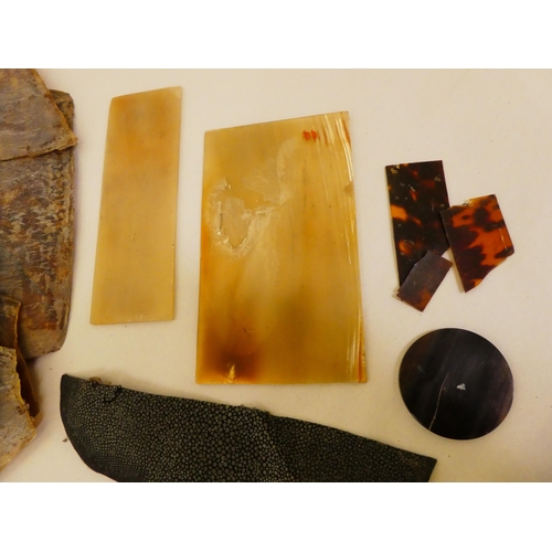 147 - A box of restoration materials: to include fragments of tortoiseshell, bone and mother-of-pearl