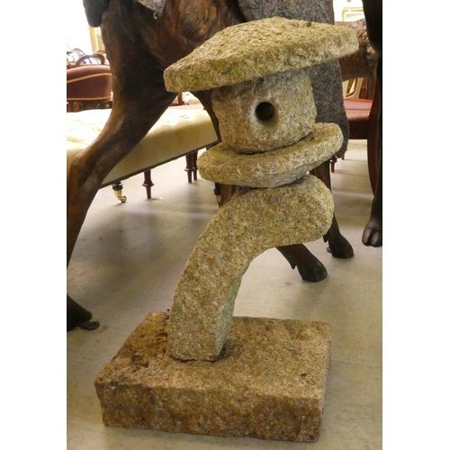 149 - A weathered granite, two part bird feeder, on a platform base&nbsp; 30