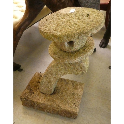 149 - A weathered granite, two part bird feeder, on a platform base&nbsp; 30