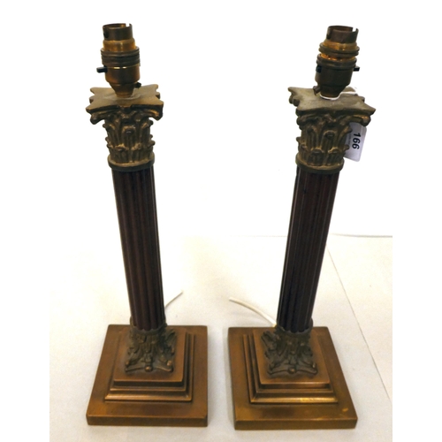 166 - A pair of wooden and brass Corinthian column table lamps&nbsp; 18