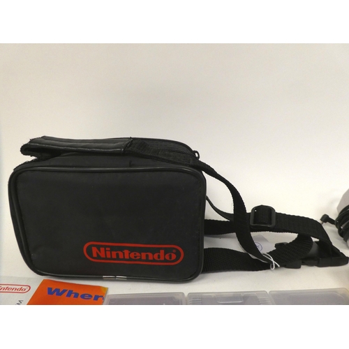 18 - A Nintendo Game Boy with various games, in a soft carrying pouch