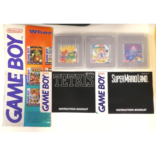 18 - A Nintendo Game Boy with various games, in a soft carrying pouch