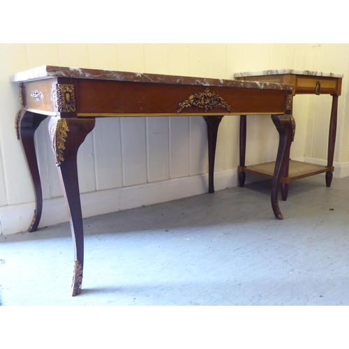 306 - A 20thC Italian marble top coffee table, raised on cabriole legs  19