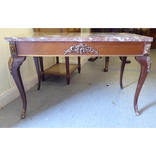 306 - A 20thC Italian marble top coffee table, raised on cabriole legs  19