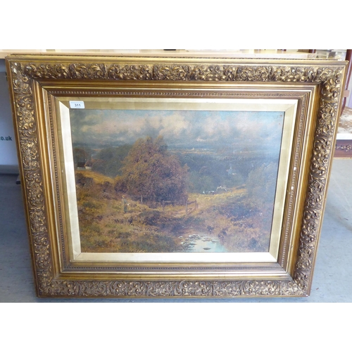 311 - Early 20thC British School - a hillside landscape  oil on canvas  bears an indistinct sign... 