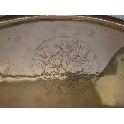 314 - A Hugh Wallis Arts & Crafts oval copper tray with spot hammered and floral decoration  bears imp... 