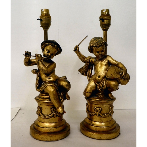 318 - Two 20thC carved giltwood table lamps, fashioned as children playing musical instruments  14