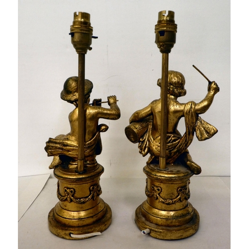 318 - Two 20thC carved giltwood table lamps, fashioned as children playing musical instruments  14