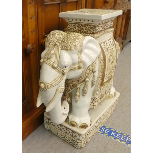 320 - Ceramics: to include a china garden seat, fashioned as an elephant  18