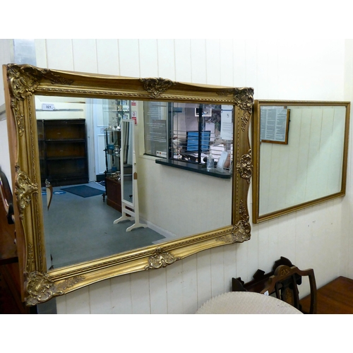 321 - Mirrors: to include a modern example with a bevelled plate, in an ornate gilt frame  43