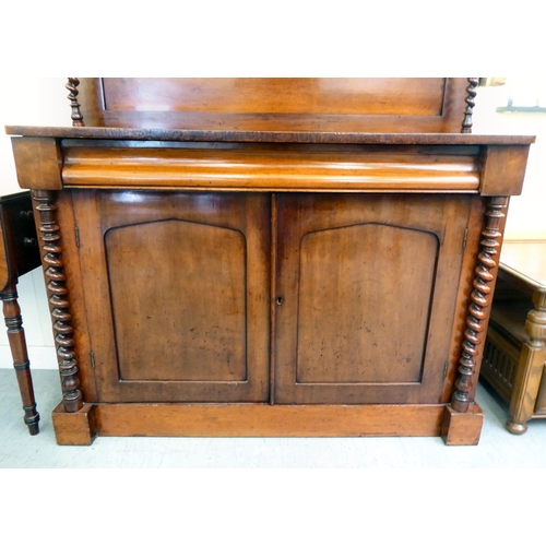 4 - A late Victorian mahogany chiffonier with a panelled back and barleytwist uprights, a frieze drawer ... 