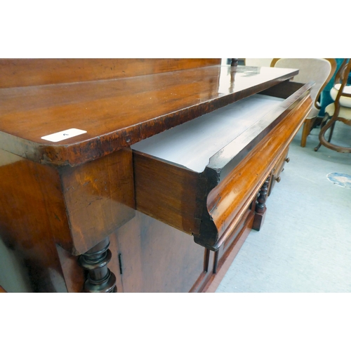 4 - A late Victorian mahogany chiffonier with a panelled back and barleytwist uprights, a frieze drawer ... 