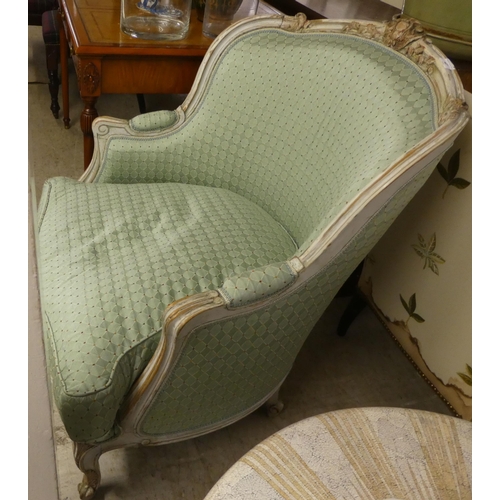 47 - A modern Louis XV design cream painted, green fabric upholstered salon chair, raised on cabriole leg... 