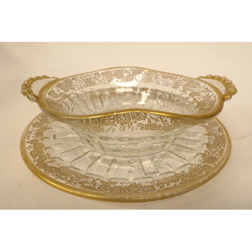 7 - Decoratively gilded and silvered glass tableware: to include a fruit bowl and servers 