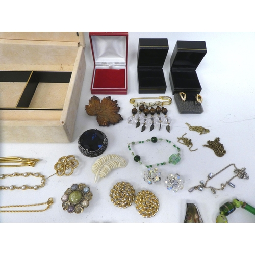 71 - Costume jewellery: to include brooches and necklaces, in a beige faux suede box