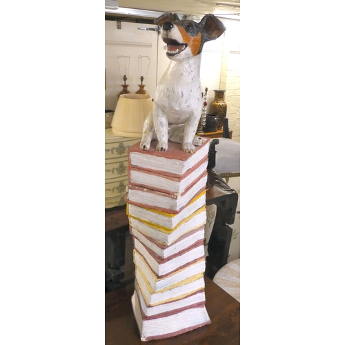 75 - A pottery ornament, fashioned as a Jack Russell, perched on a pile of books  37