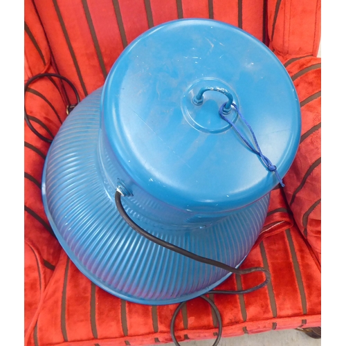 78 - A turquoise coloured alloy light with a corrugated shade  20