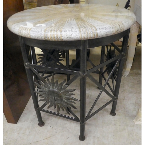 81 - A modern metal occasional table with a painted stone effect top, raised on pillar design legs  ... 