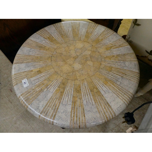 81 - A modern metal occasional table with a painted stone effect top, raised on pillar design legs  ... 