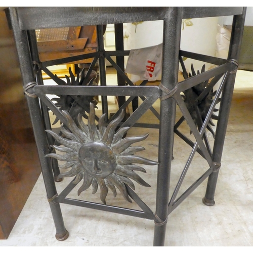 81 - A modern metal occasional table with a painted stone effect top, raised on pillar design legs  ... 