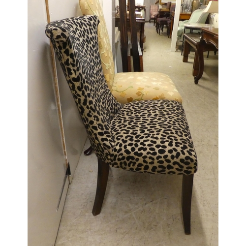 84 - Chairs: to include a bedroom chair, upholstered in leopard print fabric, raised on splayed feet