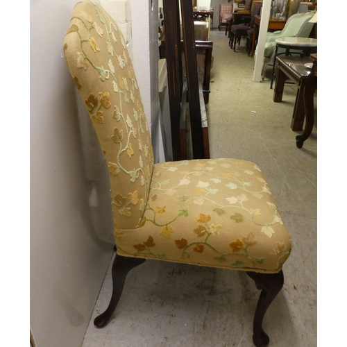 84 - Chairs: to include a bedroom chair, upholstered in leopard print fabric, raised on splayed feet