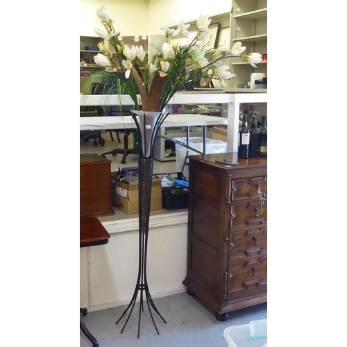 88 - A wrought metal cane design flower display stand  60