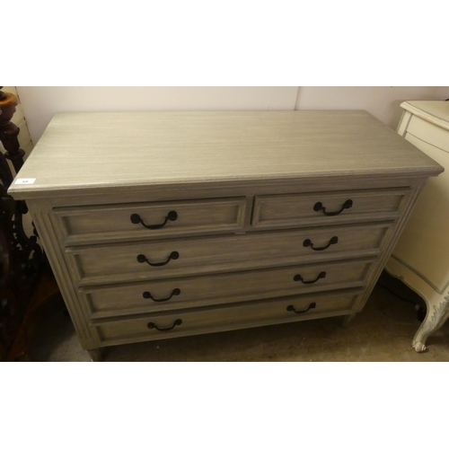 89 - A modern blue painted dressing chest with two short/three graduated long drawers, raised on turned f... 