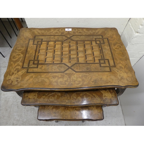 96 - A nesting set of three early 20thC beech and marquetry inlaid tables, raised on cabriole legs  large... 