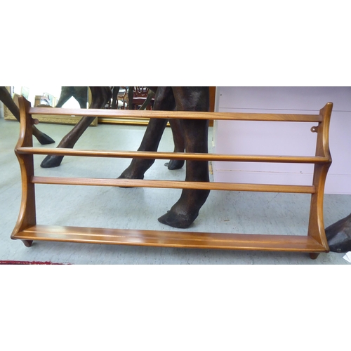 168 - An Ercol Golden Dawn beech and elm hanging, three tier plate rack&nbsp; 20