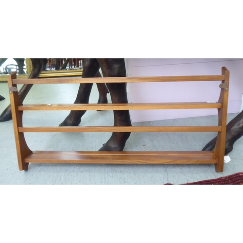 168 - An Ercol Golden Dawn beech and elm hanging, three tier plate rack&nbsp; 20