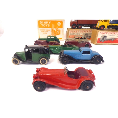 85 - Twenty five vintage Dinky painted diecast model vehicles, some boxed: to include a Guy 4 ton lorry, ... 