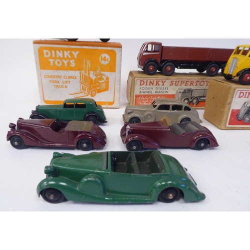 85 - Twenty five vintage Dinky painted diecast model vehicles, some boxed: to include a Guy 4 ton lorry, ... 