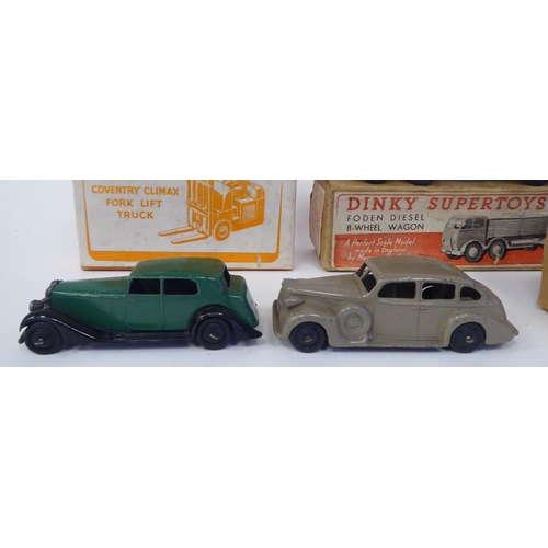 85 - Twenty five vintage Dinky painted diecast model vehicles, some boxed: to include a Guy 4 ton lorry, ... 