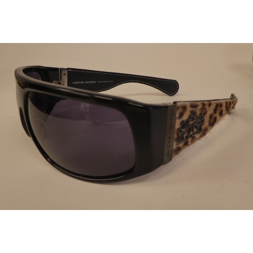 101 - Three pairs of Chrome Hearts sunglasses, two with faux leopard skin arms, one pair with pink leather... 