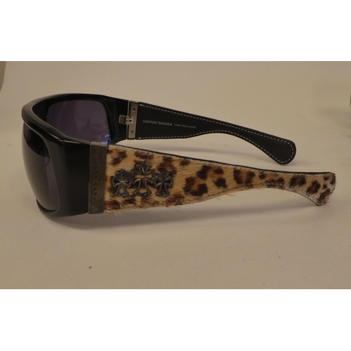 101 - Three pairs of Chrome Hearts sunglasses, two with faux leopard skin arms, one pair with pink leather... 