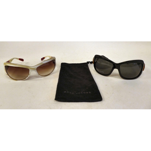 102 - A pair of Paul Smith cream and pink sunglasses; and a pair of Marc Jacobs sunglasses with a fabric c... 