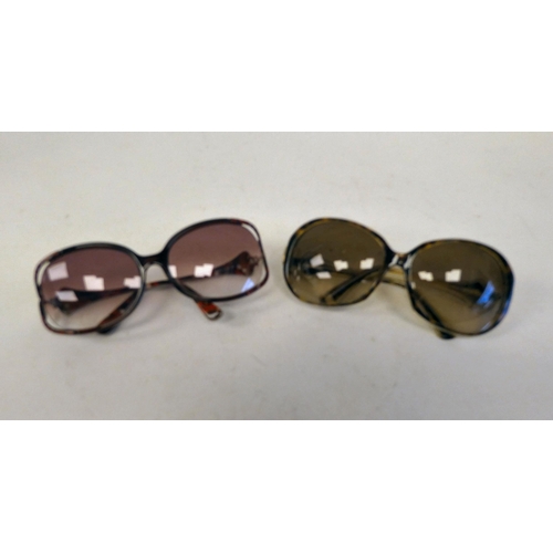 103 - Two pairs of Pucci sunglasses, one pair with pink/red frames