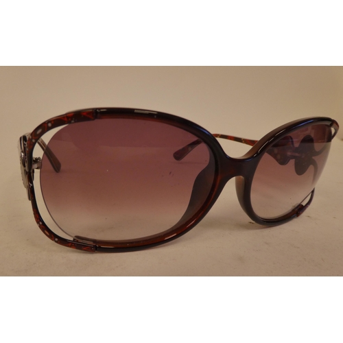 103 - Two pairs of Pucci sunglasses, one pair with pink/red frames