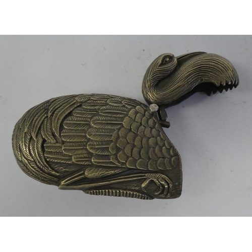 105 - A brass novelty vesta case, fashioned as a swan