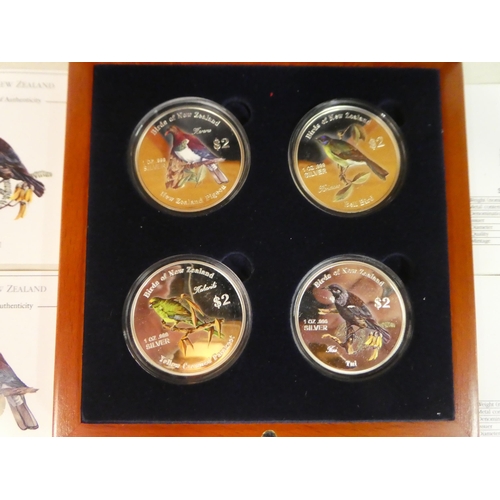 11 - A New Zealand Mint 'Birds of New Zealand' four silver proof coin set  cased