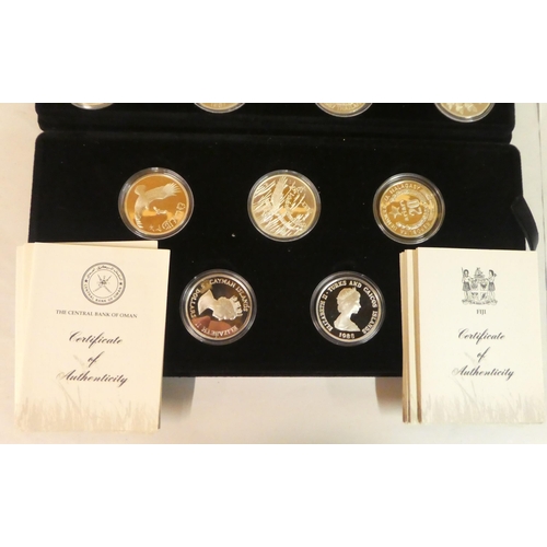 12 - A complete cased set of twenty-five silver proof coins, representing the World Wildlife Funds Countr... 
