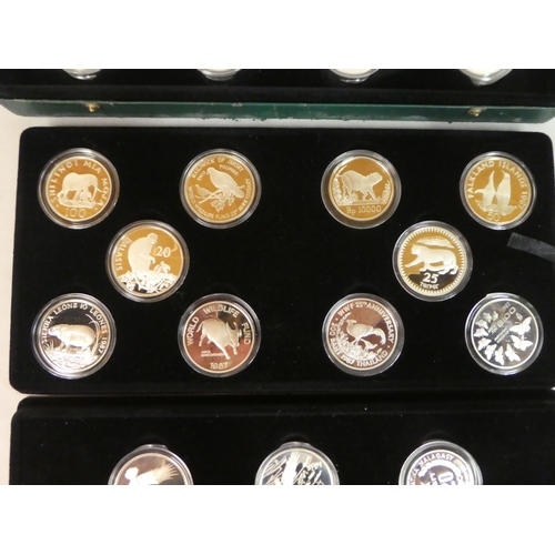 12 - A complete cased set of twenty-five silver proof coins, representing the World Wildlife Funds Countr... 