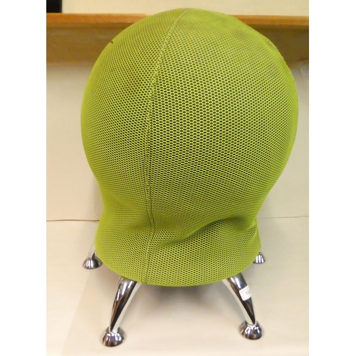 132 - A Topstar exercise stool, finished in pea green coloured fabric, raised on stainless steel legs
