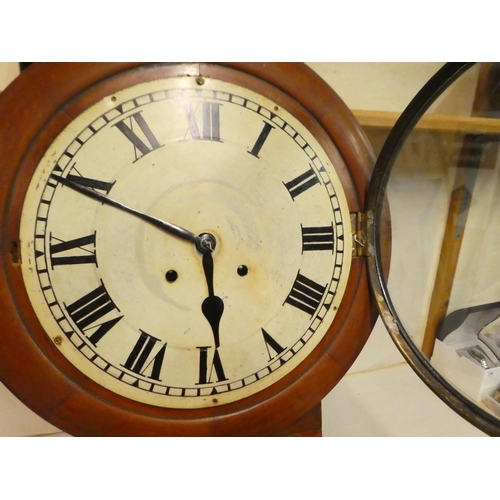 134 - A Newhaven Clock Co mahogany cased, drop dial wall clock with a pendulum window; the bell strike mov... 