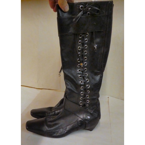 158 - A pair of Dior black leather knee high boots with a low heels and laced side detail  size 40