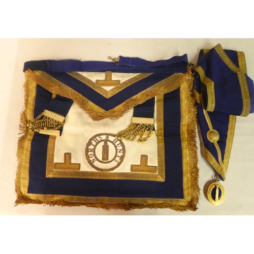 206 - Masonic regalia, in a brown hide attaché case with papers and medallions, relating to the Nor... 