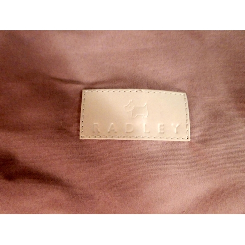 230 - A Radley brown hide handbag with a dust cover